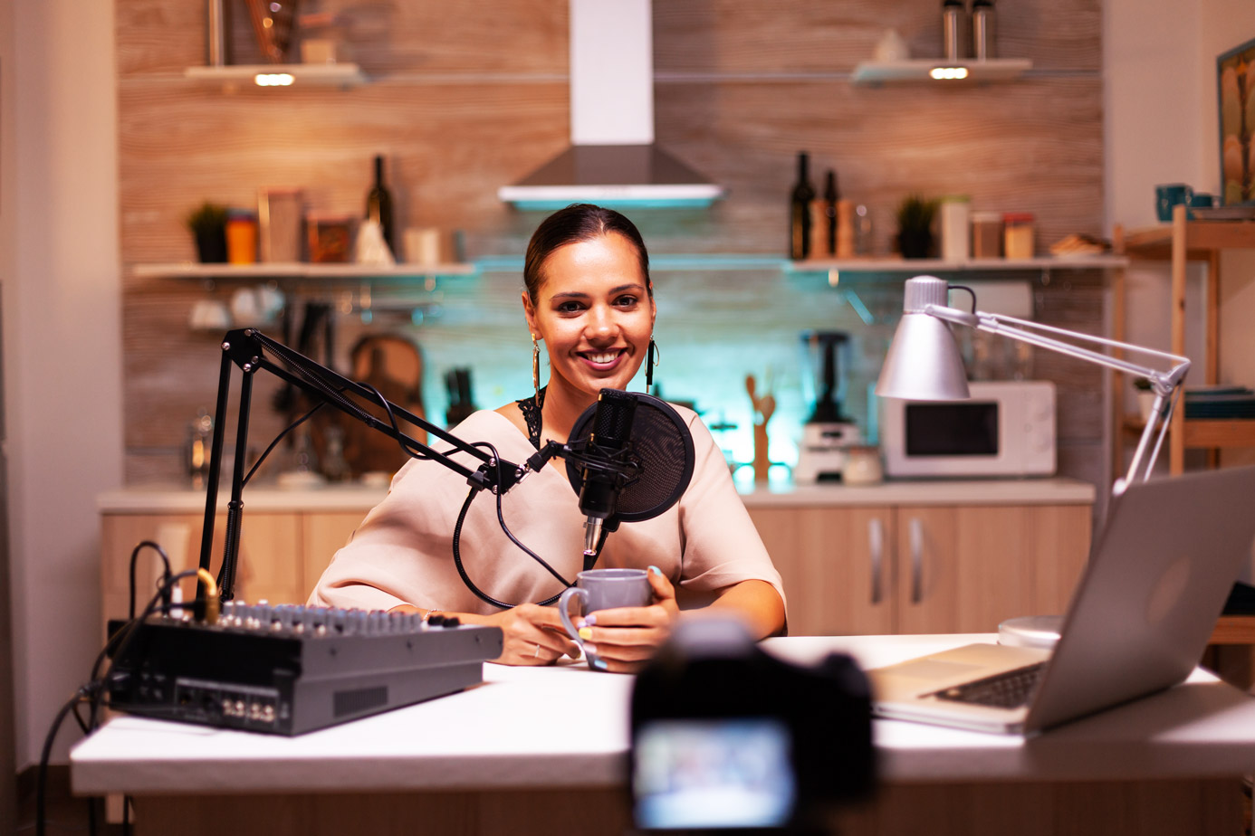 blogger-looking-while-recording-video-speaking-microphone